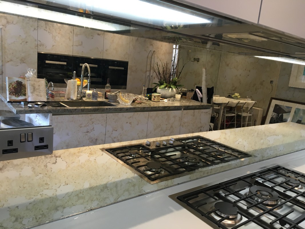 Mirror glass splashback in Canning Town luxury kitchen